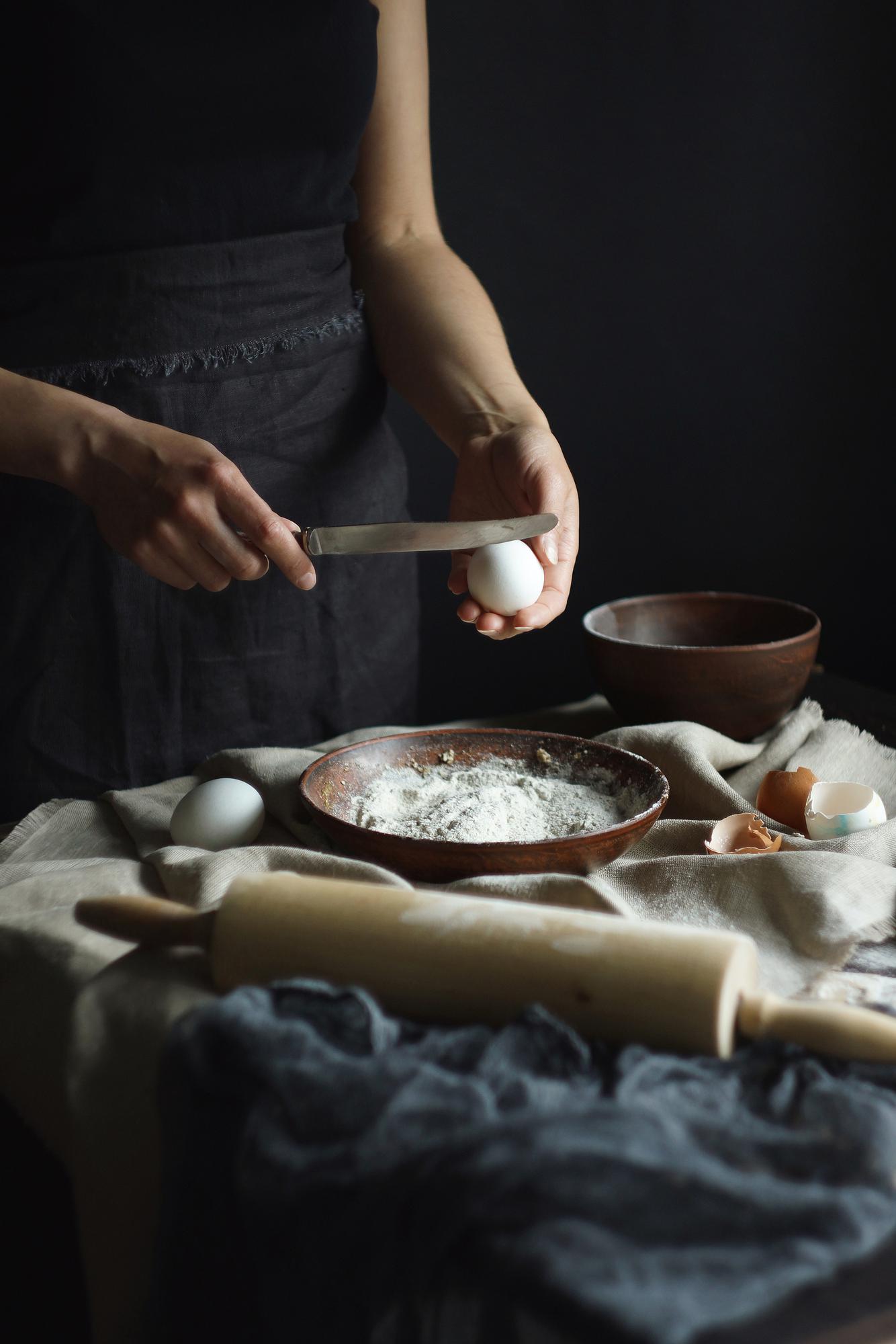Hands preparing pastry in studio